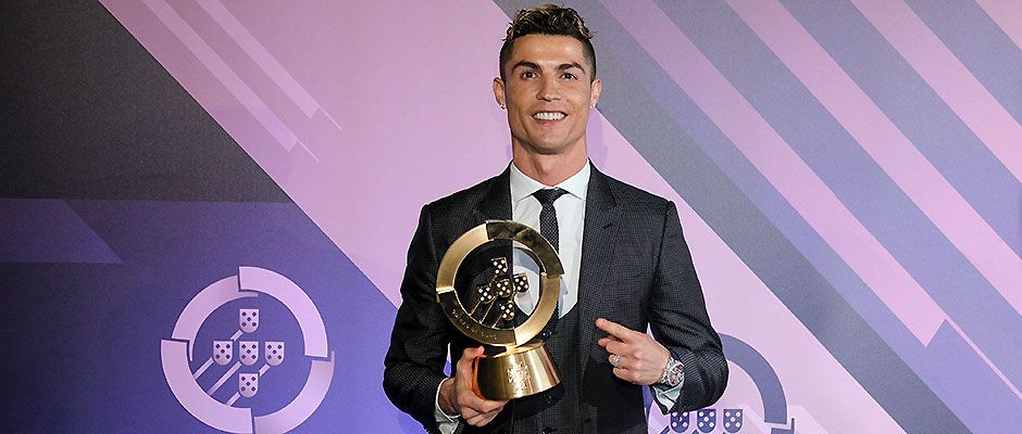 Ronaldo holding a trophy